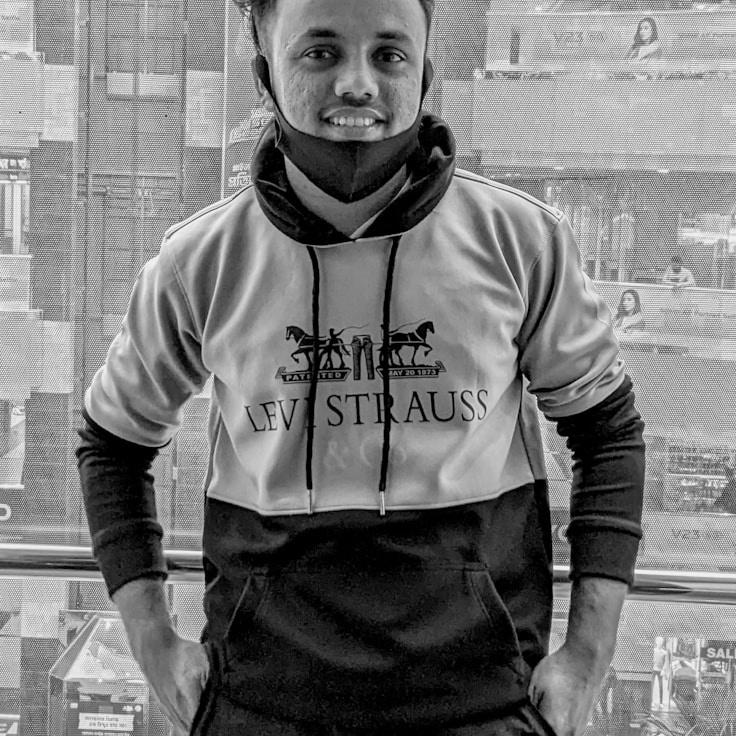 Jordan Reed, Client Relations Director, discussing corporate gifting strategy with business clients